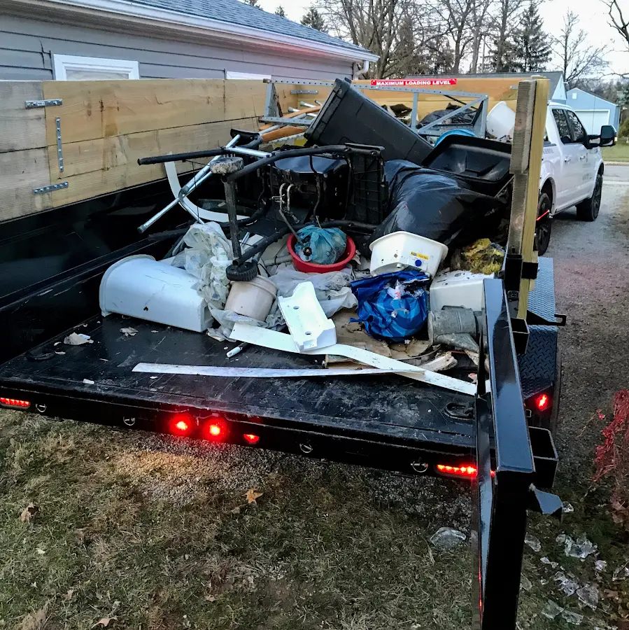Roll-off dumpster delivered to a residential driveway in Cobleskill